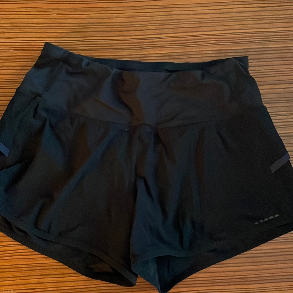 Lululemon speed short variation with reflective details. Size 4. Like new.